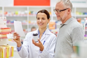 pharmacist assisting customer